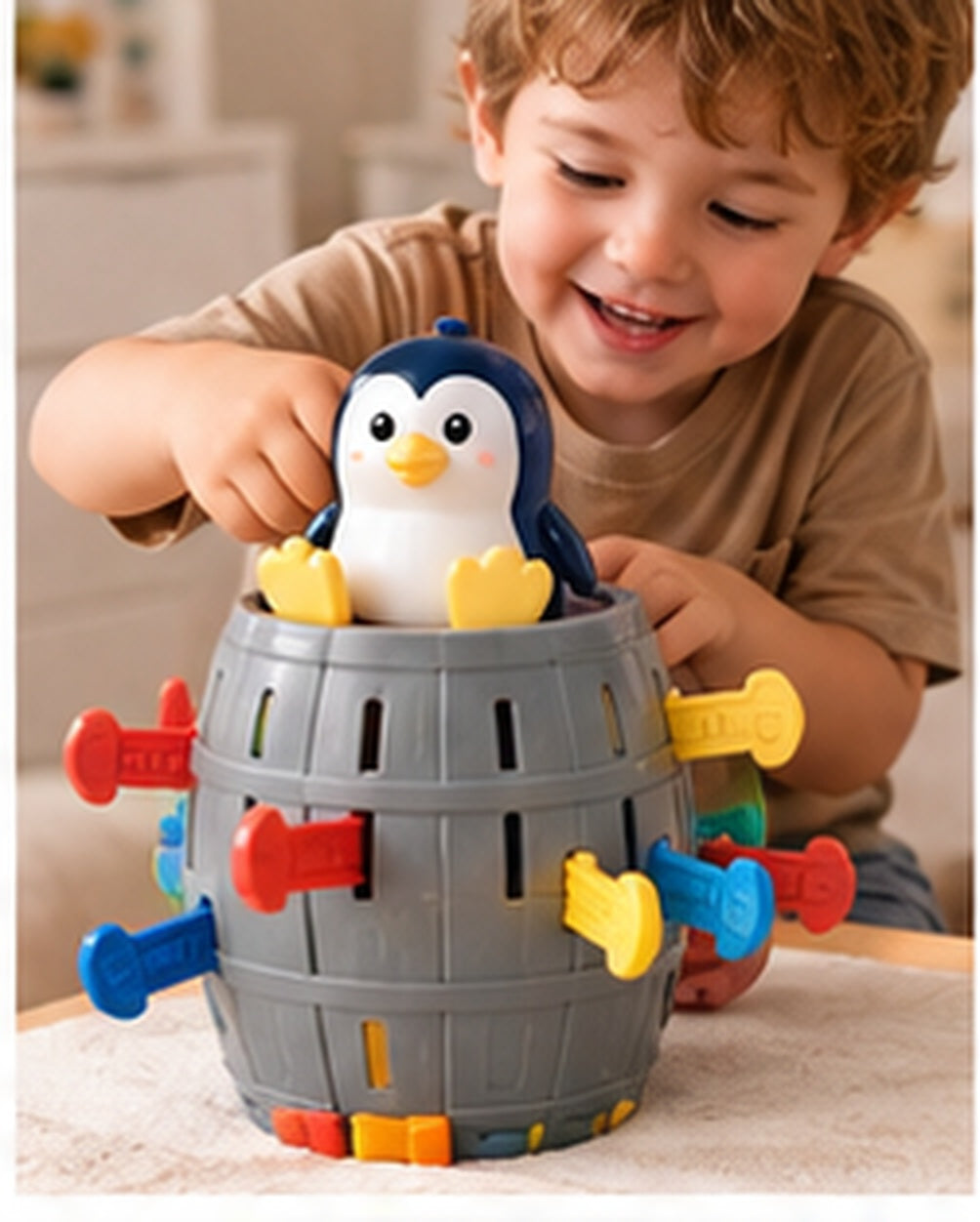 Penguin Pop-Up Barrel Game in a realistic play setting